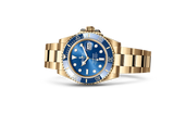 Rolex Submarine yellow gold and a blue dial date  comInline Delivery Info